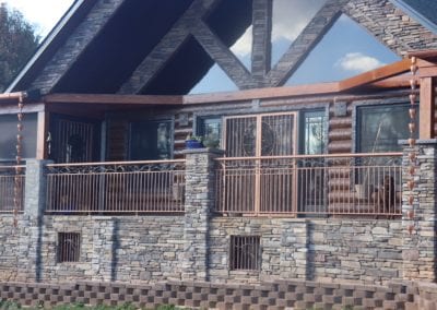 copper gutters for a rustic stone cabin