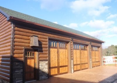 brown gutters on a garage with a log cabin look